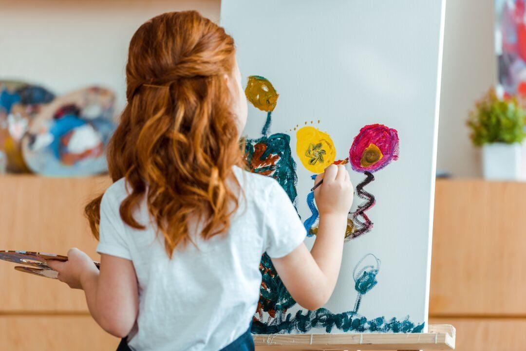 Back View Of Redhead Child Painting On Canvas In A 2023 11 27 05 30 02 Utc